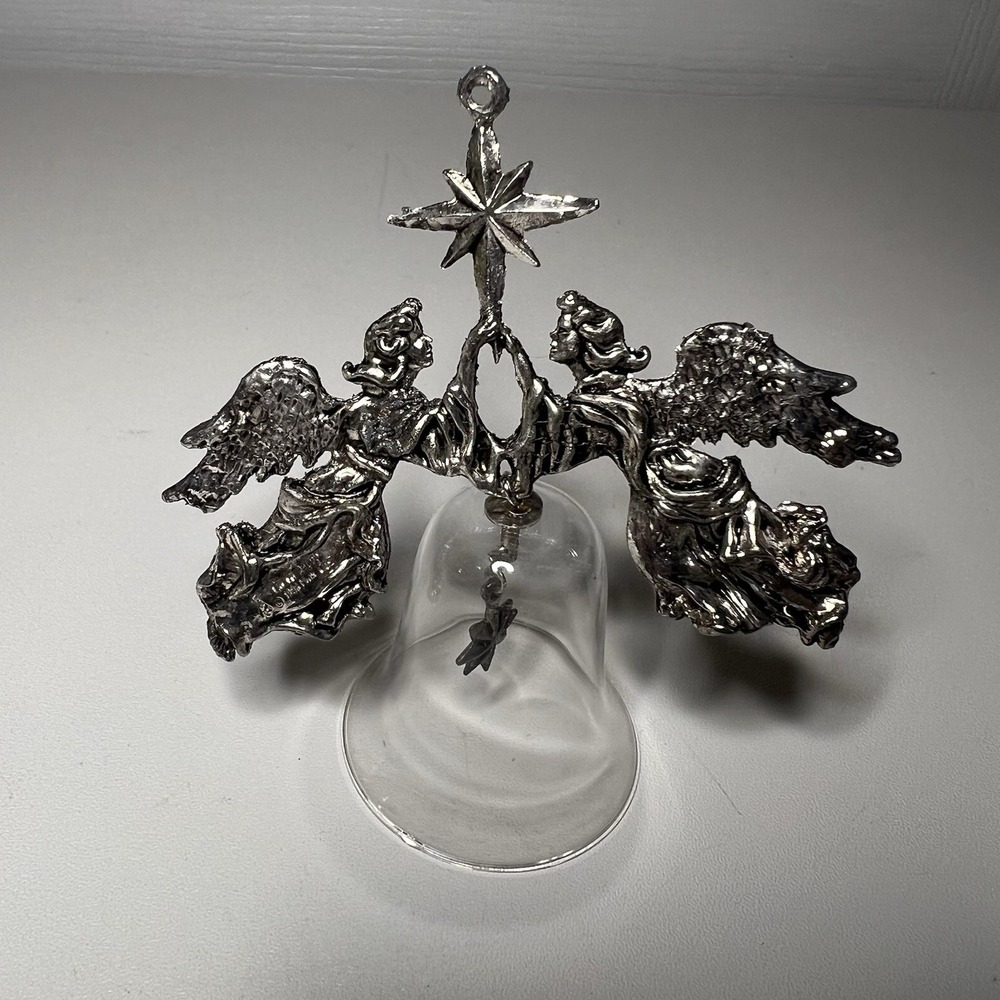 1988 Hallmark Holiday Heirloom Collection silver-plated angels and star ornament